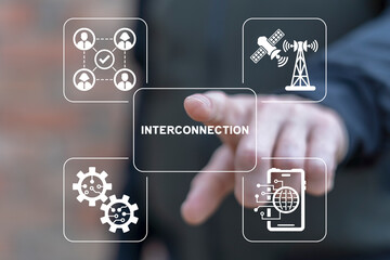Man using virtual screen clicks word: INTERCONNECTION. Interconnected digital cyber era technology....