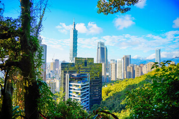 Fototapeta premium Taipei, Taiwan, Republic of China, 01 21 2024: Taipei City (in Republic of China, Taiwan) and mountain at sun set seen from elephant mountain park