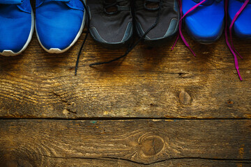 Close up of sneakers on wooden background