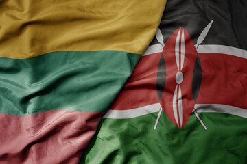 big waving national colorful flag of kenya and national flag of lithuania .
