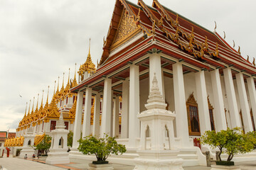 Beautiful sky and Wat Ratchanatdaram Temple in Bangkok, Thailand.