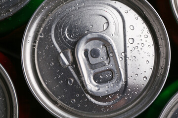 Energy drink in wet can, top view. Functional beverage