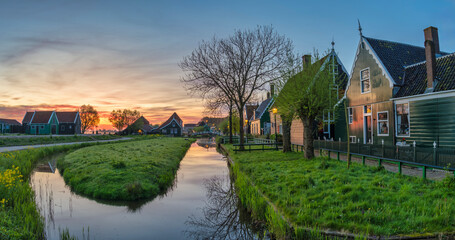 Dutch traditional house panorama sunrise at Zaanse Schans Village, Netherlands