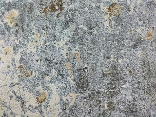 Texture of an old cement wall with a beautiful pattern. Selective focus.
