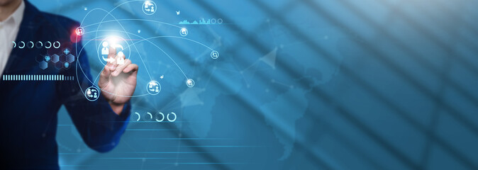 B2B: Businessman Pointing with B2B Icon and Technological Business Data Network. Inter-Company Transactions, Supply Chain Integration, Market Analysis, Customer Relationship Management.