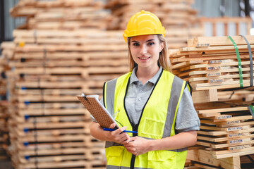 Engineer wearing safety vest controlling industrial machine working, talking with assistant worker checking first for labour with laptop computer, Officer setting a technology system in factory.