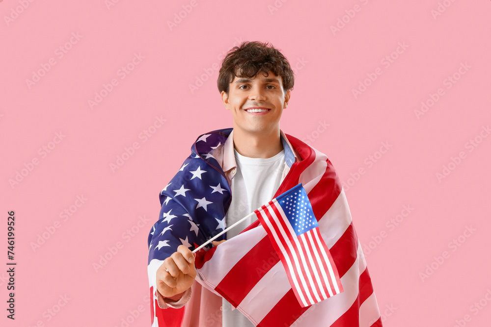 Poster Young man with USA flags on pink background