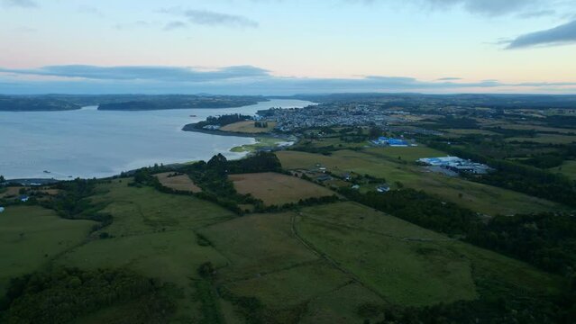Rural Water Aerial Drone Landscape at Chonchi, Chiloe, Lemuy Island Water Sky, reflection of delta houses and rural villages, travel destination at Patagonia south america