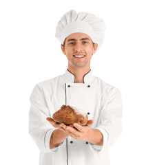 Handsome young chef with fresh bread isolated on white background