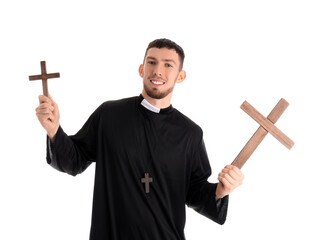 Young priest with crosses on white background