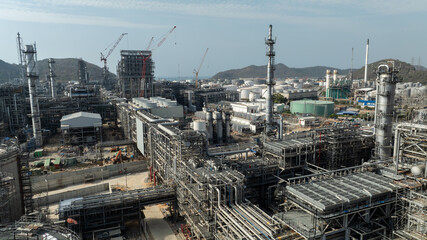 industrial plant construction, large new oil refinery and petrochemical construction project, aerial view