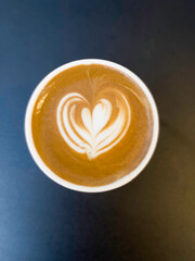 Cup of hot latte art coffee