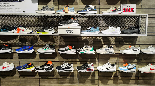 Phuket, Thailand - Jan 25.2024: Nike shoes displayed on shelves in a fashion store. Sport and casual footwear concept.