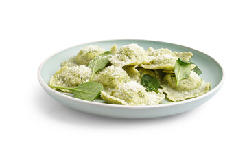 Plate of tasty ravioli with spinach and cheese on white background
