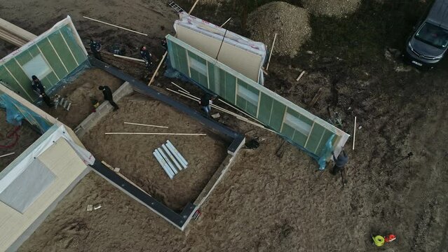Installation of Prefabricated Wall Panels - Construction Site. - aerial shot