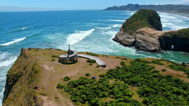 Aerial drone fly above time dock, muelle del tiempo, landmark at chilo&eacute; sea shore, hills island and coastline scene, patagonia, chile