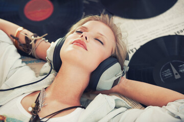 Relax, music and woman with headphones on floor for streaming subscription, audio and radio. Podcast, smile and above of person listening to playlist, song and track in home with vinyl records - obrazy, fototapety, plakaty