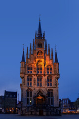 A scenic view of Stadhuis van Gouda, is old City Hall of Gouda in the Netherlands during nighttime