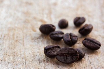 coffee beans on grunge wooden background