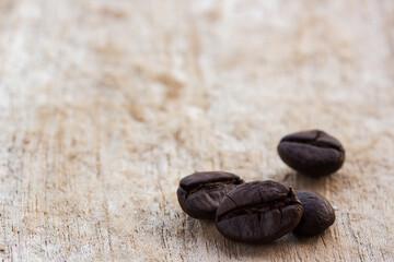 coffee beans on grunge wooden background