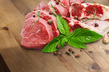 Raw red beef steak with herbs