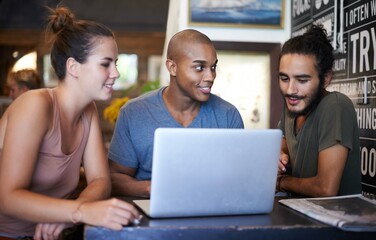 Diverse, team and laptop in cafe for discussion, creative and ideas in conversation. Digital, search and information technology for colleague, teamwork and happy smile for web design on internet.