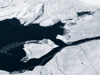 aerial of winter frozen lake with snow in china