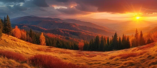 Foto op Canvas A stunning painting capturing the beauty of an autumn sunset amidst the majestic Beskidy mountains. © AkuAku