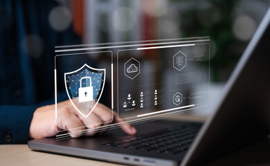Cybersecurity awareness and data protection. Engineer or IT staff use computer to set firewall networks for safe information clouding. Protection from hackers, identification, and authentication.