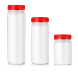 Set of white jars with colored cap without label isolated on a white background