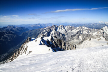 Snowy winter moutains with blue sky