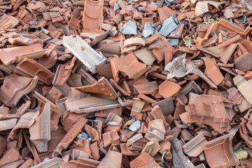Packs of old reused mediterranean pile of broken roof tiles