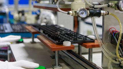 Workshop of computer keyboards production.