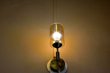 Dim light bulb in living room.
