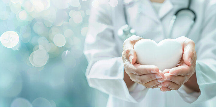 Caring Hands Holding Heart Symbol: Compassionate Healthcare Professional