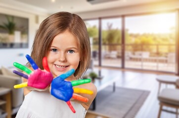 Child drawing Paint on hands do homework from home.