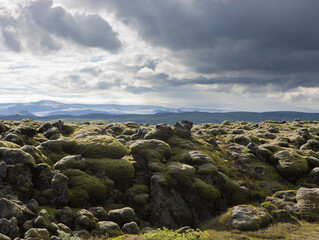 A large rocky landscape with a cloudy sky
