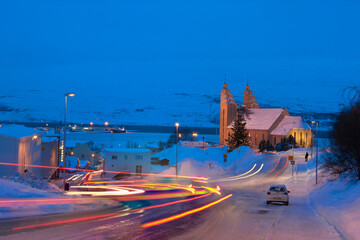 A car driving on a snowy road