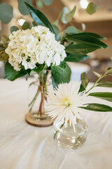 White Hydrangea in a vase on a table