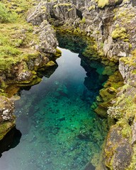 Naklejka na ściany i meble Crystal clear water in Thingvellir National Park, Iceland