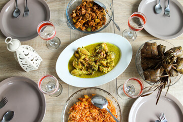Ketupat served with various special indonesian food. Traditional menu during Eid mubarak in Indonesia.