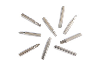 Set of heads for screwdriver (bits) on white background. Set of working tools and bits. Screwdriver metal bits. 
