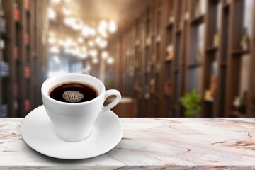 Wooden table at coffee shop  with a cup