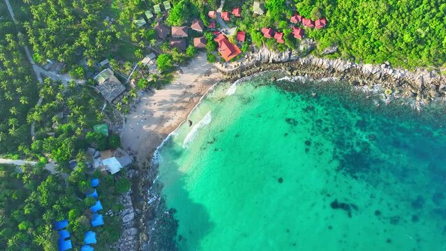 A tropical haven offering diving escapades amidst azure waters and lush landscapes. Aerial drone. Sea stock footage. Tao island, Surat Thani, Southern Thailand. Beach background. 4K HDR.
