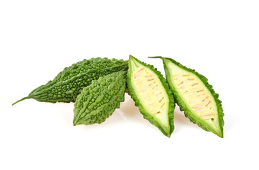 Fototapeta premium Slice of bitter melon or half of Bitter gourd (Momordica charantia L.) isolated on white background.