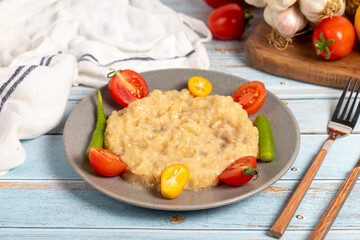 Roasted eggplant salad. Appetizer foods. Eggplant salad on blue wood background. Close up