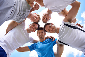 Men, circle and portrait with sports in low angle for hug, support or teamwork at training in nature. People, group and happy to embrace in huddle, scrum or together for exercise, workout or fitness - obrazy, fototapety, plakaty
