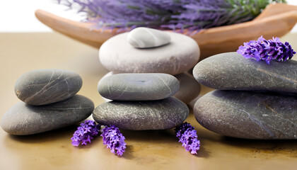 Fototapeta na wymiar Spa still life with stack of stones and lavenders