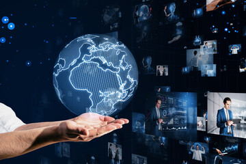 Hand cradling digital globe, global network connectivity concept. Dark blue background