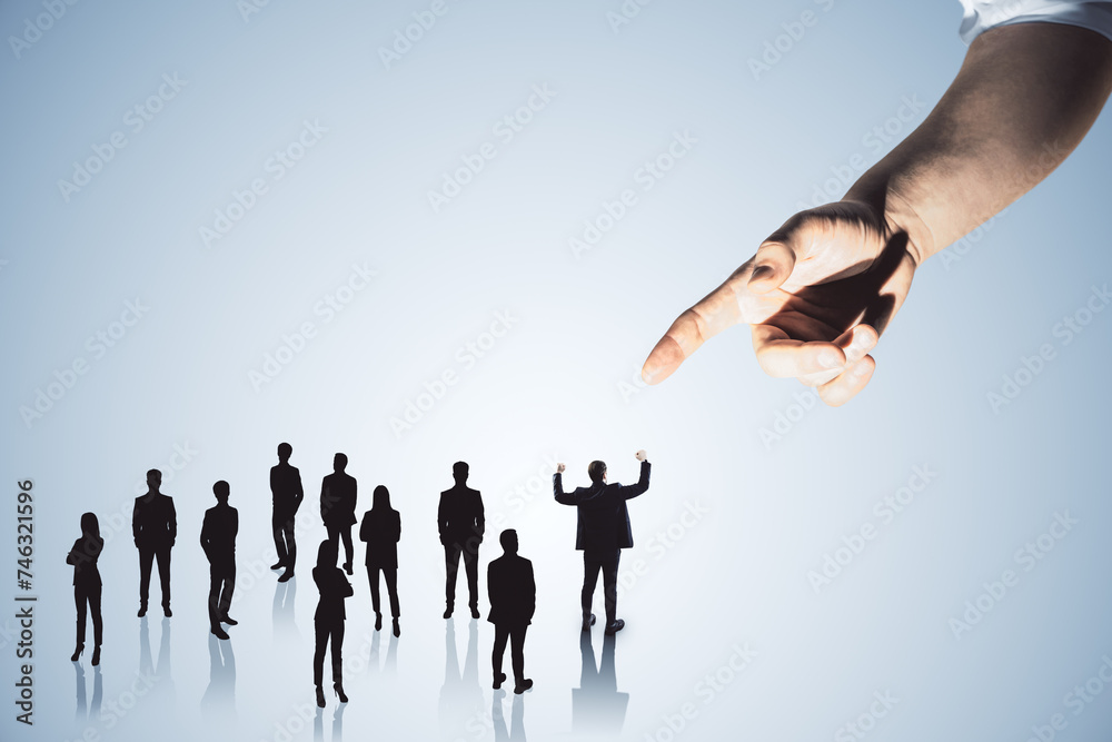 Poster hand pointing at crowd of businessmen on light backdrop. worker management concept.